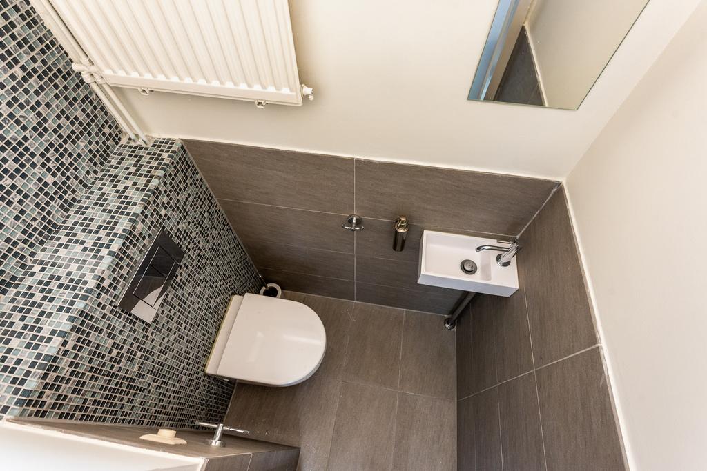 Te huur: Foto Woonhuis aan de Groenewegje 106 in 's-Gravenhage