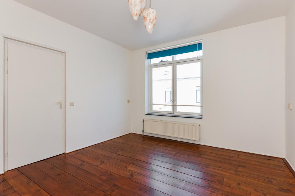 Te huur: Foto Woonhuis aan de Groenewegje 106 in 's-Gravenhage