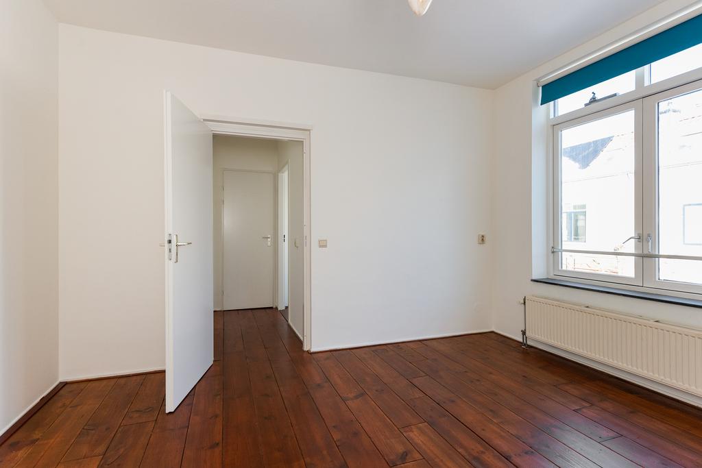 Te huur: Foto Woonhuis aan de Groenewegje 106 in 's-Gravenhage