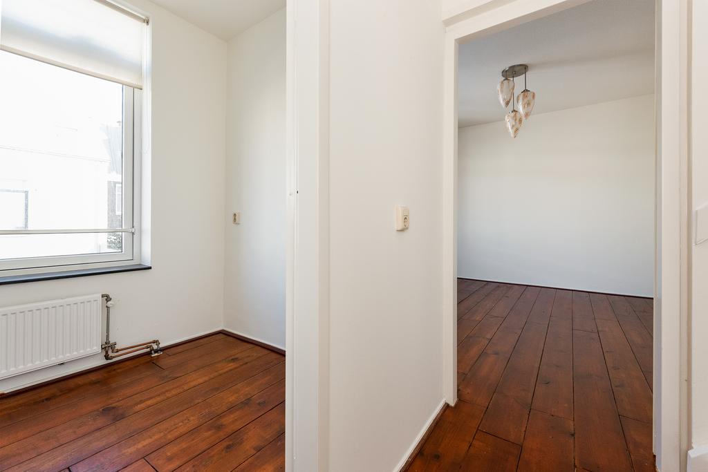 Te huur: Foto Woonhuis aan de Groenewegje 106 in 's-Gravenhage