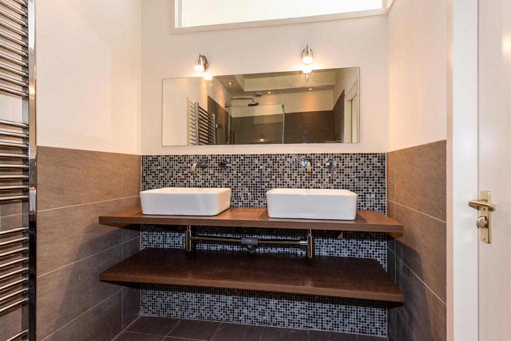 Te huur: Foto Woonhuis aan de Groenewegje 106 in 's-Gravenhage